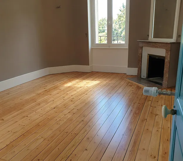 pose de parquet en bois massif